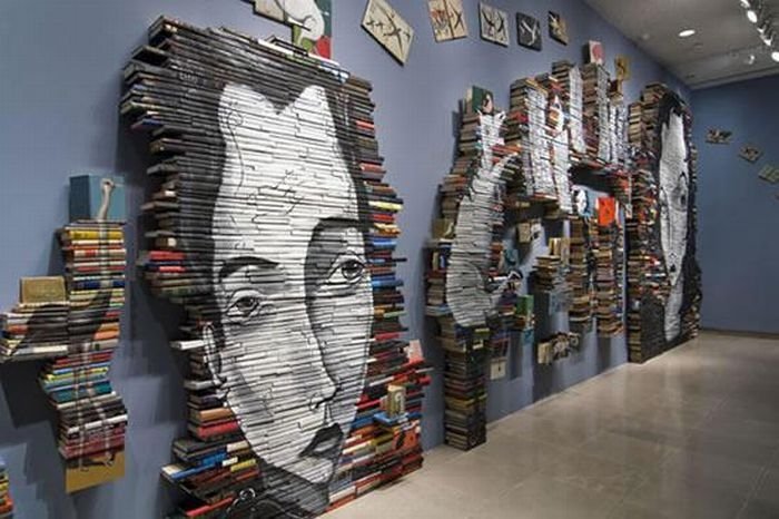 artwork on spines of stacked books
