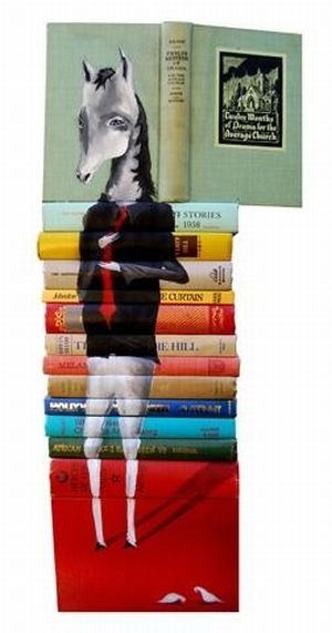 artwork on spines of stacked books