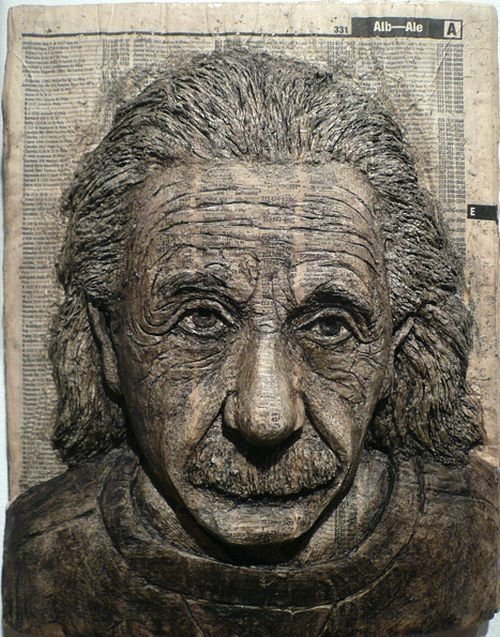 Phone book carvings by Alex Queral