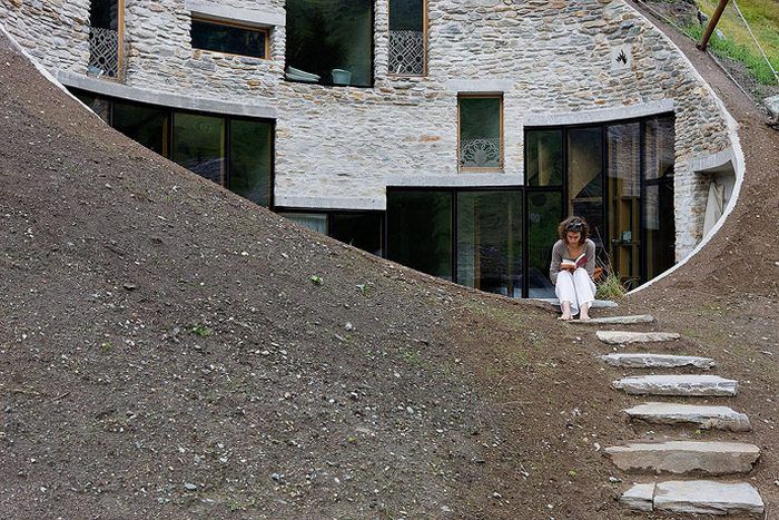House built inside a mountain, Alps, Switzerland