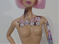 TopRq.com search results: modern barbie with tattoos