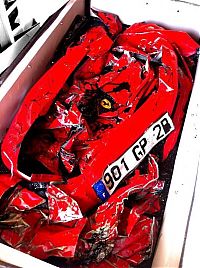 TopRq.com search results: Crashed Ferrari table by Charly Molinelli