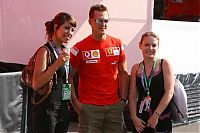 Motorsport models: Michael Schumacher Ferrari Posing With Some Girls In The Paddock Magny Cours 2006-07-15