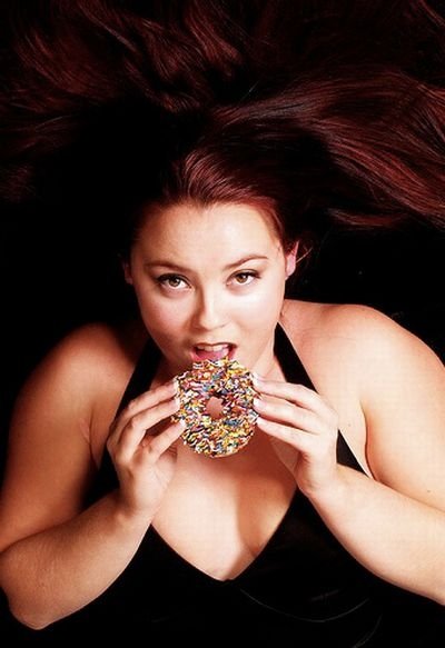 girl eating doughnut