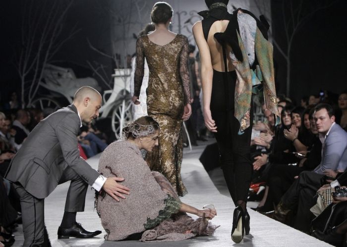 models falling on the catwalk