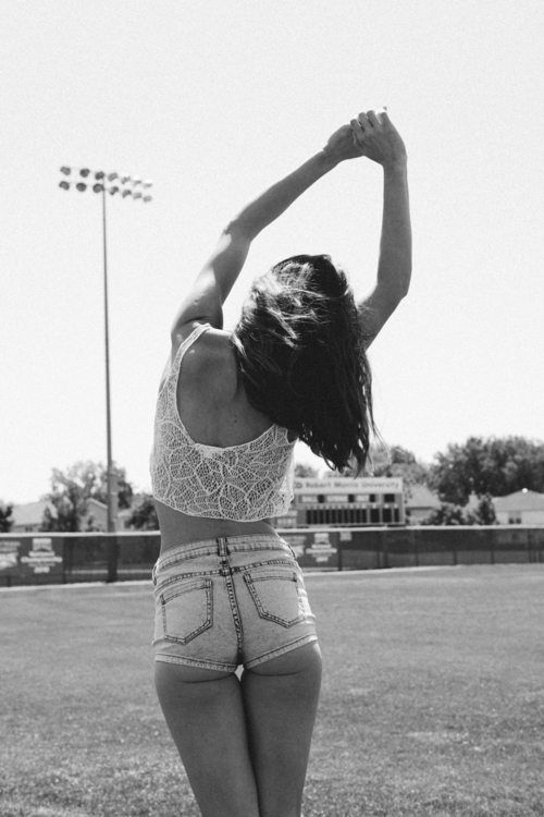 young girl in jean shorts