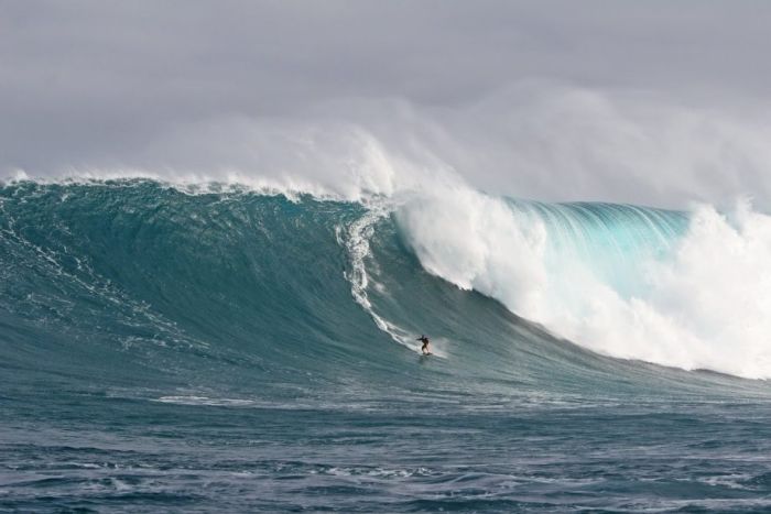 surfing huge waves