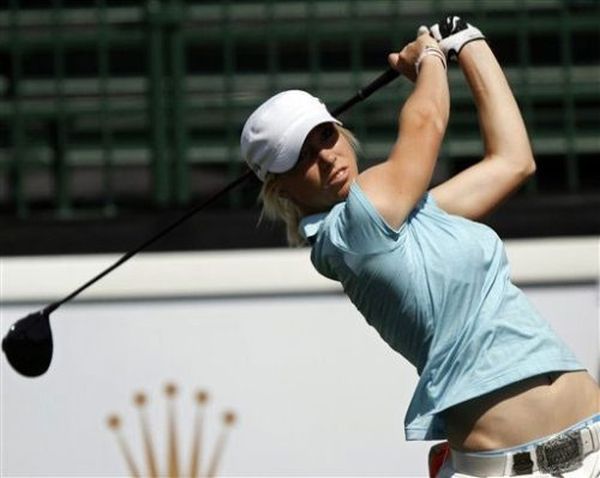girl playing golf