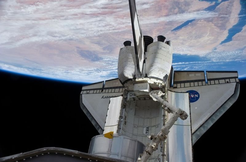 Space Shuttle Discovery home after 15-day mission